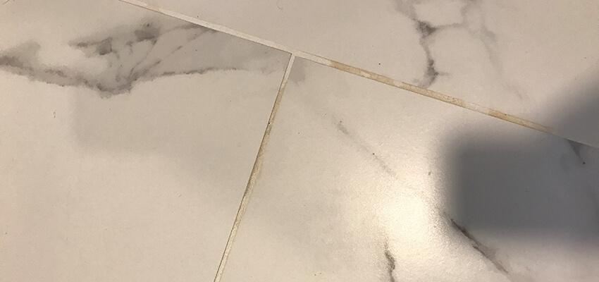 discolored grout on tile